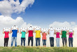 Photo: Group of young people holding papers with smileys Group of young people holding papers with smileys