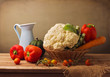 Still life with fresh vegetables on wooden table