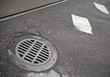 Sewer manhole cover on the roadside