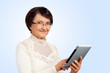 Photo: Portrait of senior woman with digital tablet Portrait of senior woman with digital tablet