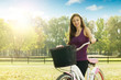 Cheerful girl with a bicycle