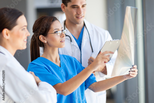 Photo: group of medical workers working together in hospital group of medical workers working together in hospital