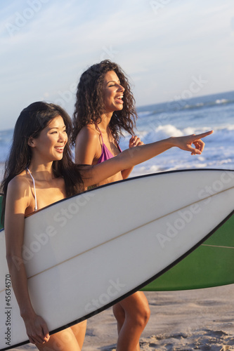 Photo: Beautiful Bikini Women Surfers & Surfboards At Beach Beautiful Bikini Women Surfers & Surfboards At Beach