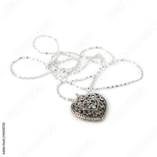 Photo: Silver heart pendant necklace, Isolated on white Silver heart pendant necklace, Isolated on white