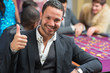 Smiling an thumbs up at roulette table