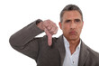 Thumbs down from a disapproving man