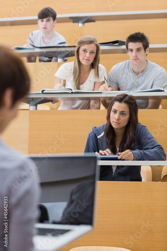Photo: Students looking at the teacher Students looking at the teacher