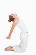 Photo: Woman in camel yoga pose Woman in camel yoga pose