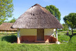 Old rural house with a straw roof