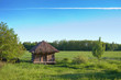 Old rural house with a straw roof