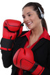 Customer service agent wearing boxing gloves