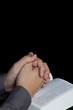 Photo: Praying hand with holy bible Praying hand with holy bible