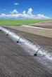 Photo: Farm field with irrigation system Farm field with irrigation system