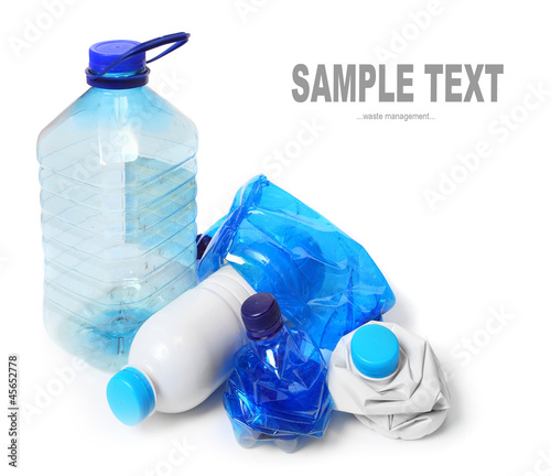 Photo: Empty plastic bottles. Waste management concept. Empty plastic bottles. Waste management concept.