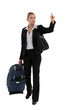 Woman with luggage hailing taxi