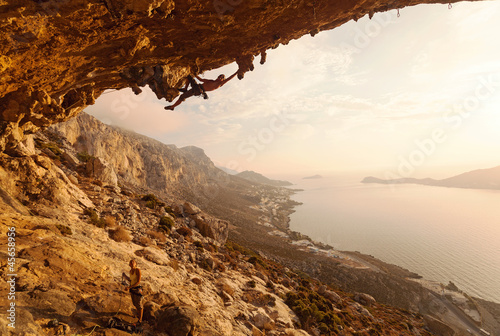 Fototapeta Rock climber at sunset, Kalymnos Island, Greece