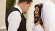 Groom goes near bride