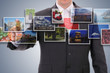 Man choosing one of 3d streaming images