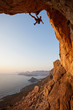 Rock climber at sunset, Kalymnos Island, Greece