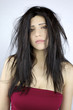 Bad hair day for beautiful woman with long hair
