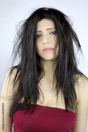 Photo: Bad hair day for beautiful woman with long hair Bad hair day for beautiful woman with long hair