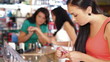 Girl Shopping in Cosmetics Store