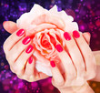 manicure and rose on a beautiful background