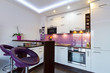 Modern white and purple kitchen interior