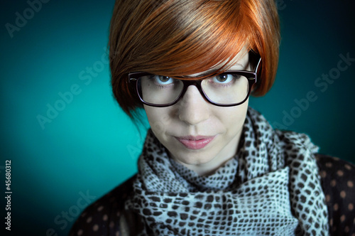 Photo: Girl with red hair and glasses Girl with red hair and glasses