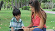 Asian Boy Has Fun Learning To Read