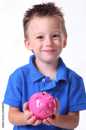 Photo: Kind mit Sparschwein 2 Kind mit Sparschwein 2