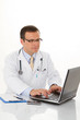Male doctor write medical reports