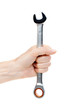 Foto: Woman's hand holding a chrome wrench. Woman's hand holding a chrome wrench.