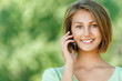 smiling beautiful young woman with phone