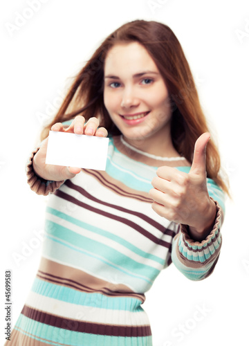 Photo: Girl showing business card and thumb up Girl showing business card and thumb up
