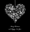 Heart from white snowflakes