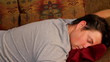 Man sleeping on sofa