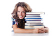 Photo: Student with lots of books on white Student with lots of books on white