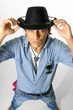 Photo: young man wearing cowboy young man wearing cowboy