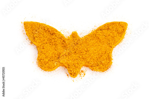 Photo: Heap ground Curry (Madras Curry) isolated in butterfly shape on Heap ground Curry (Madras Curry) isolated in butterfly shape on