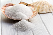 Photo: white crystal salt in seashell white crystal salt in seashell
