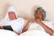 Retired couple in bed