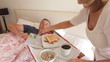 Video: Senior Woman Bringing Husband Breakfast In Bed Senior Woman Bringing Husband Breakfast In Bed