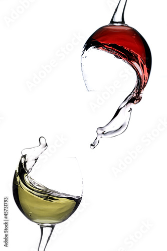 Photo: Splashing wine on a white background Splashing wine on a white background