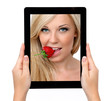 Photo: woman hands holding a tablet computer with a beautiful blonde wi woman hands holding a tablet computer with a beautiful blonde wi