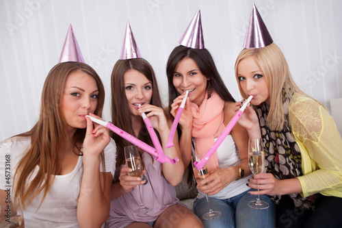 Photo: Four attractive females celebrating Four attractive females celebrating