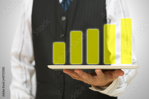 Illustration: Holographic bar graph on tablet pc Holographic bar graph on tablet pc