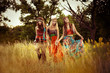 Girls of hippie in the field
