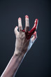 Bloody zombie hand, extreme body-art