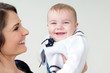 mother and baby with big smiles